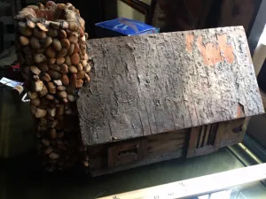 Log Cabin Sculpture - Bob Murray