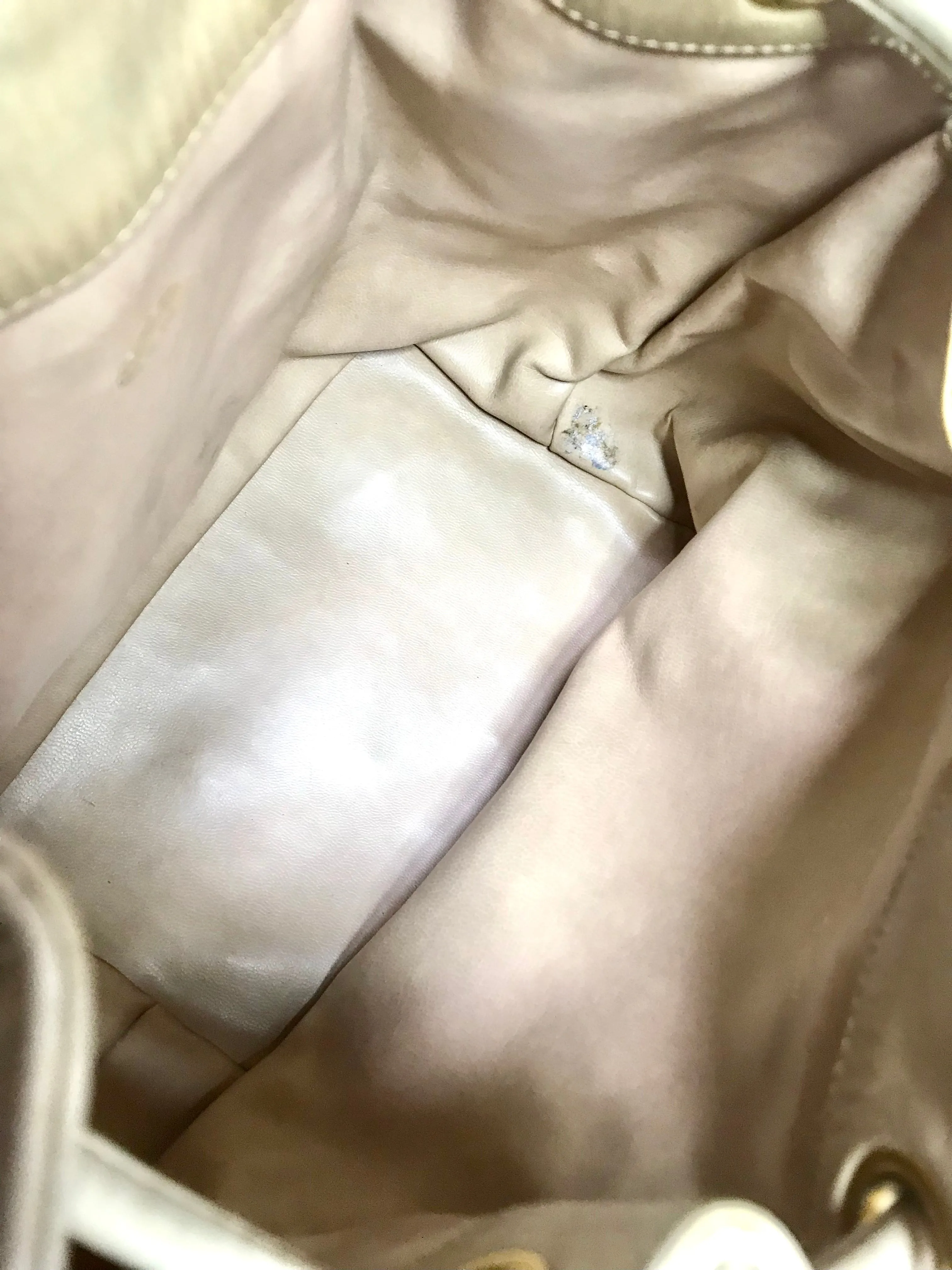 Vintage CHANEL beige quilted lamb leather hobo bucket shoulder bag with drawstrings and golden CC mark ball. 050320r3