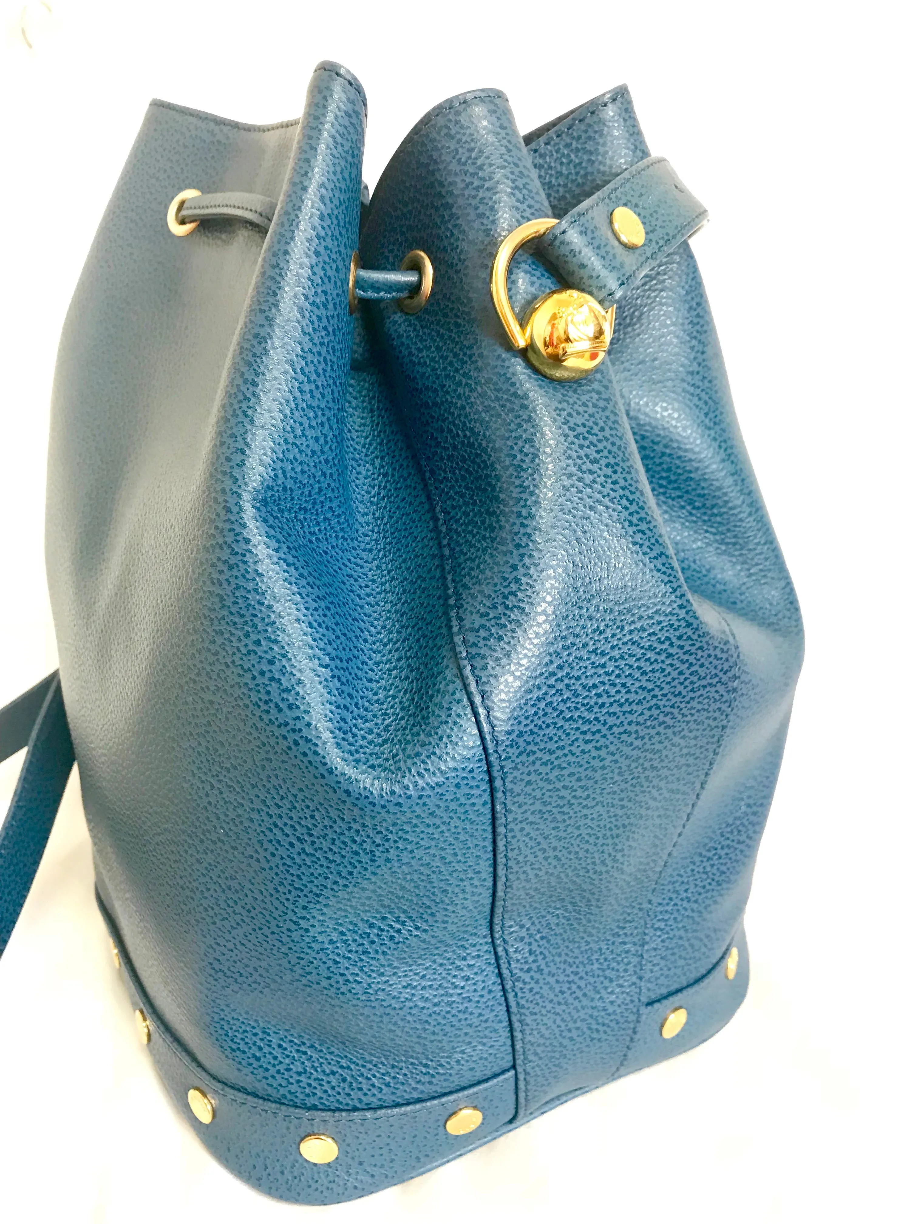 Vintage LANVIN blue grained leather hobo bucket shoulder bag with golden logo motifs.