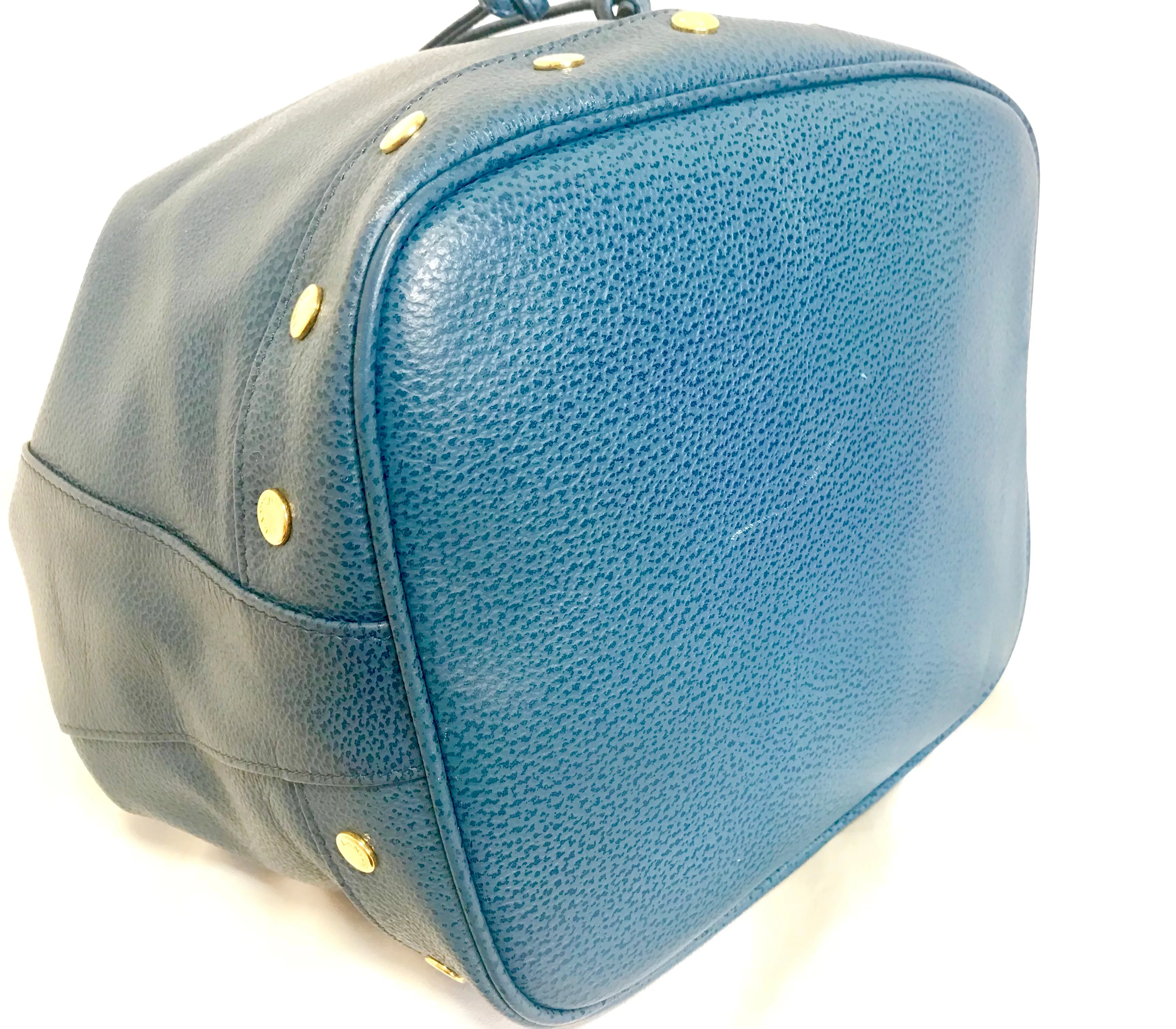 Vintage LANVIN blue grained leather hobo bucket shoulder bag with golden logo motifs.
