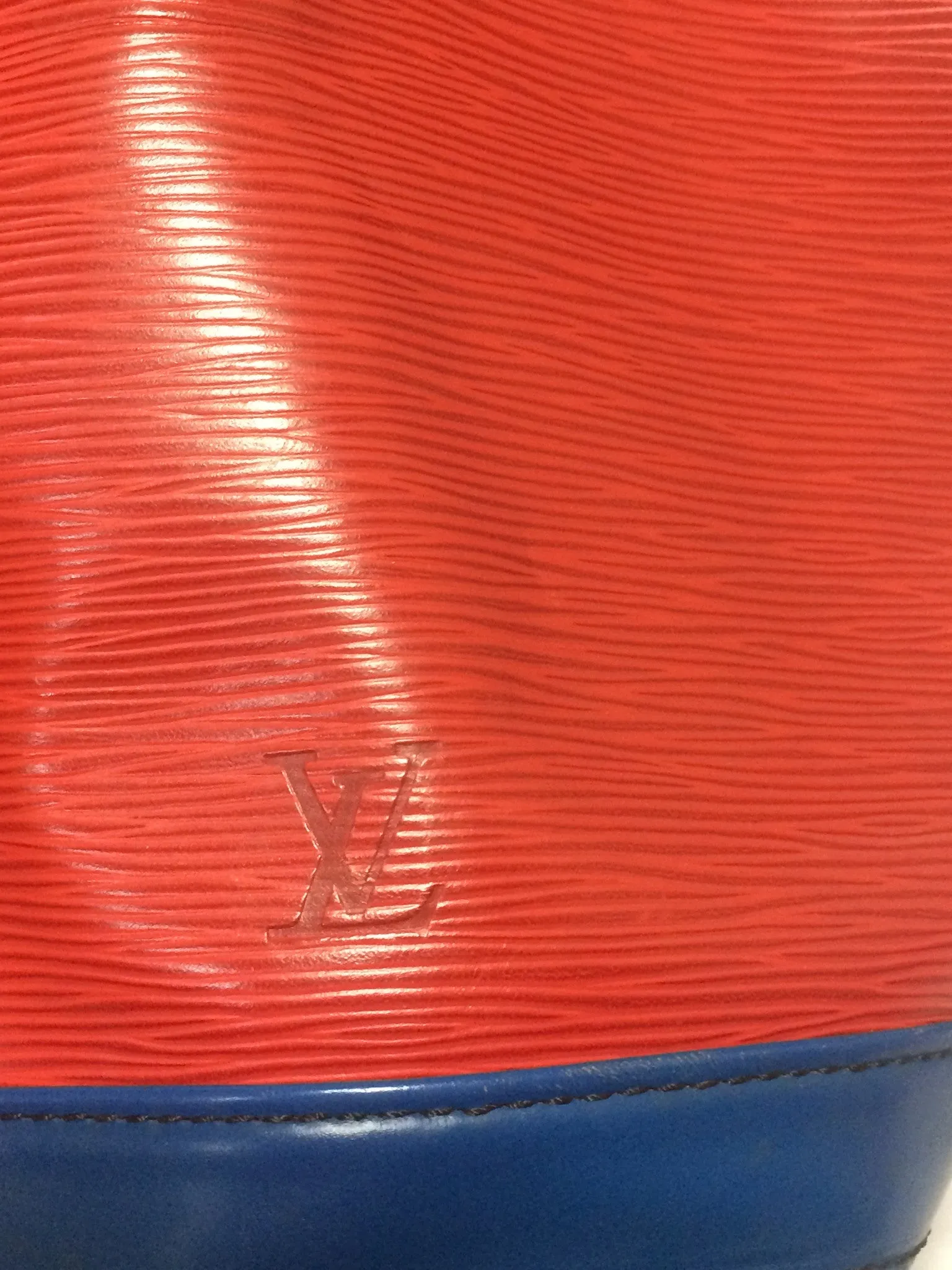 Vintage Louis Vuitton red, blue, and green, epi bucket hobo GM noe shoulder bag. Classic LV bag.