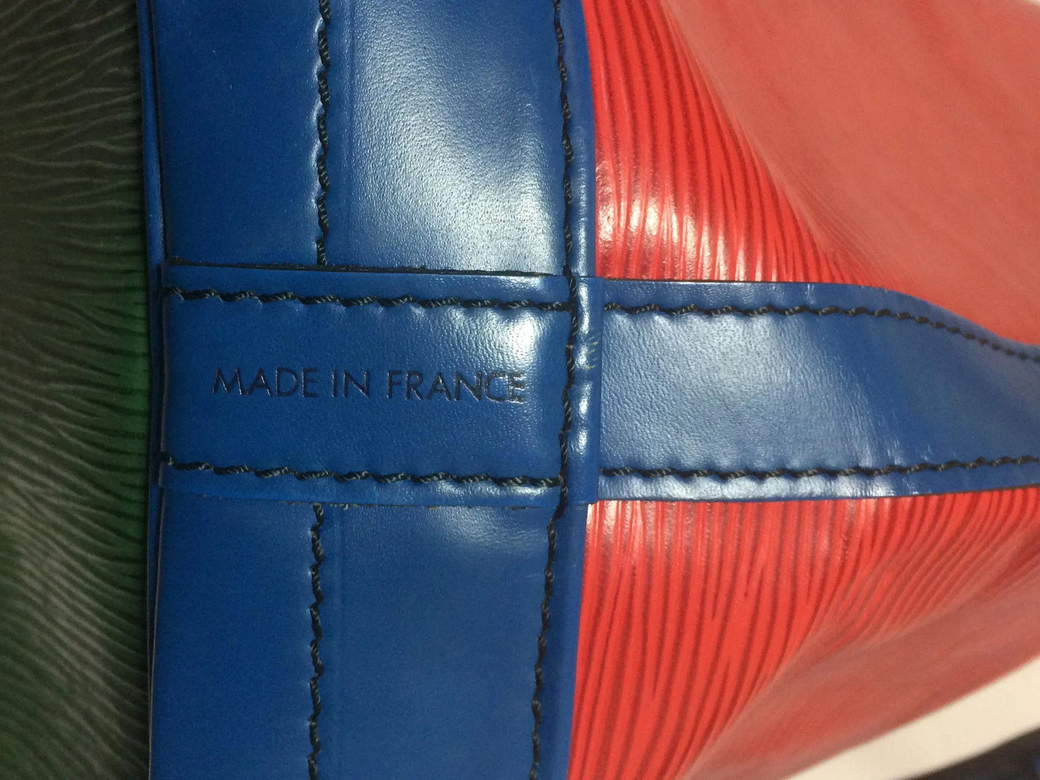 Vintage Louis Vuitton red, blue, and green, epi bucket hobo GM noe shoulder bag. Classic LV bag.