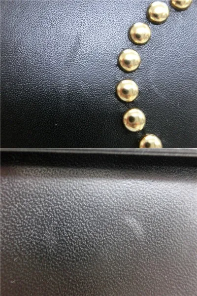 Vintage MOSCHINO black leather handbag in classic kelly purse style with golden studded heart, X, and O, playful motifs. Perfect daily bag